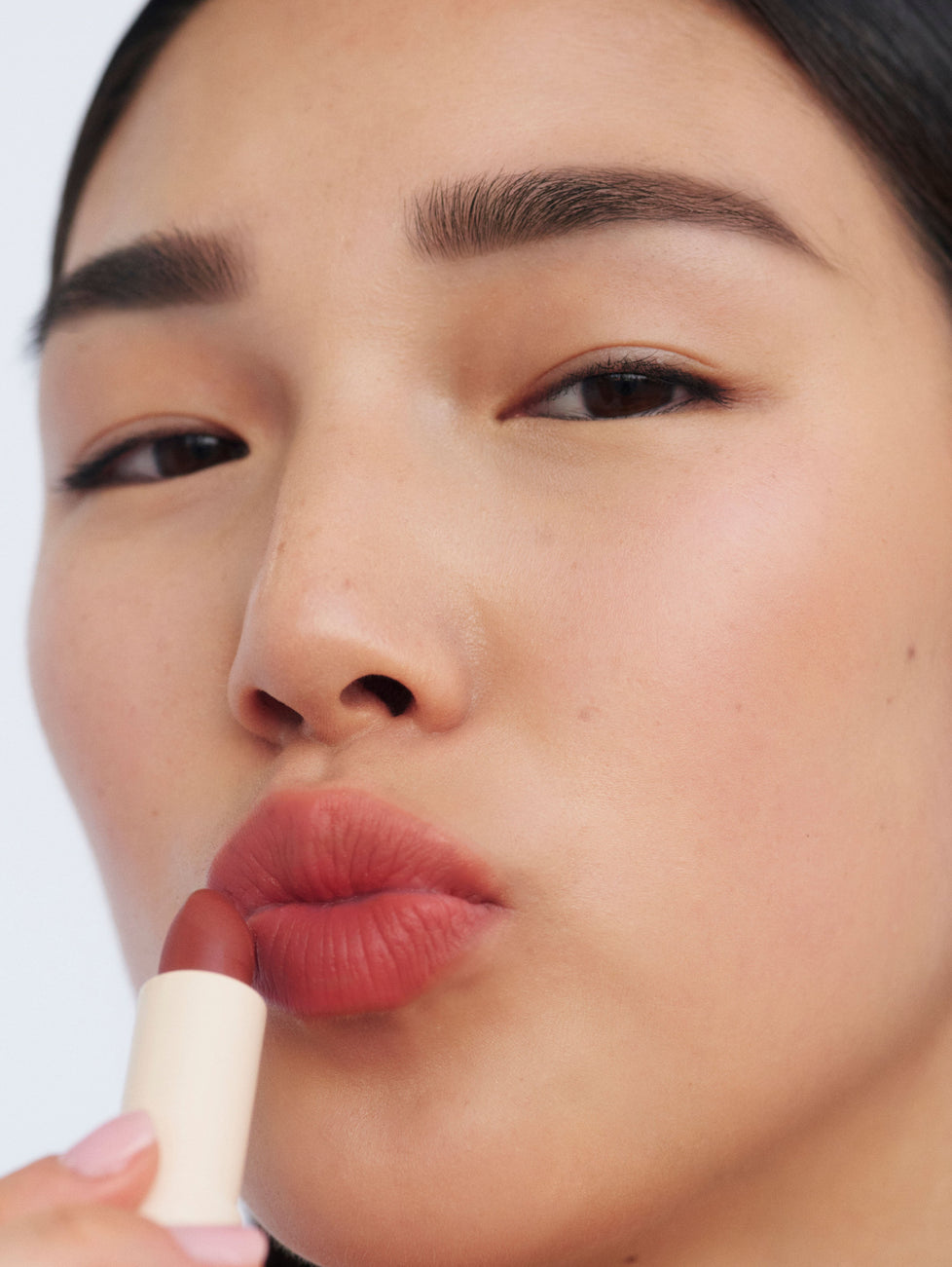 Amelia wears Fluffbalm in Perfect Pink